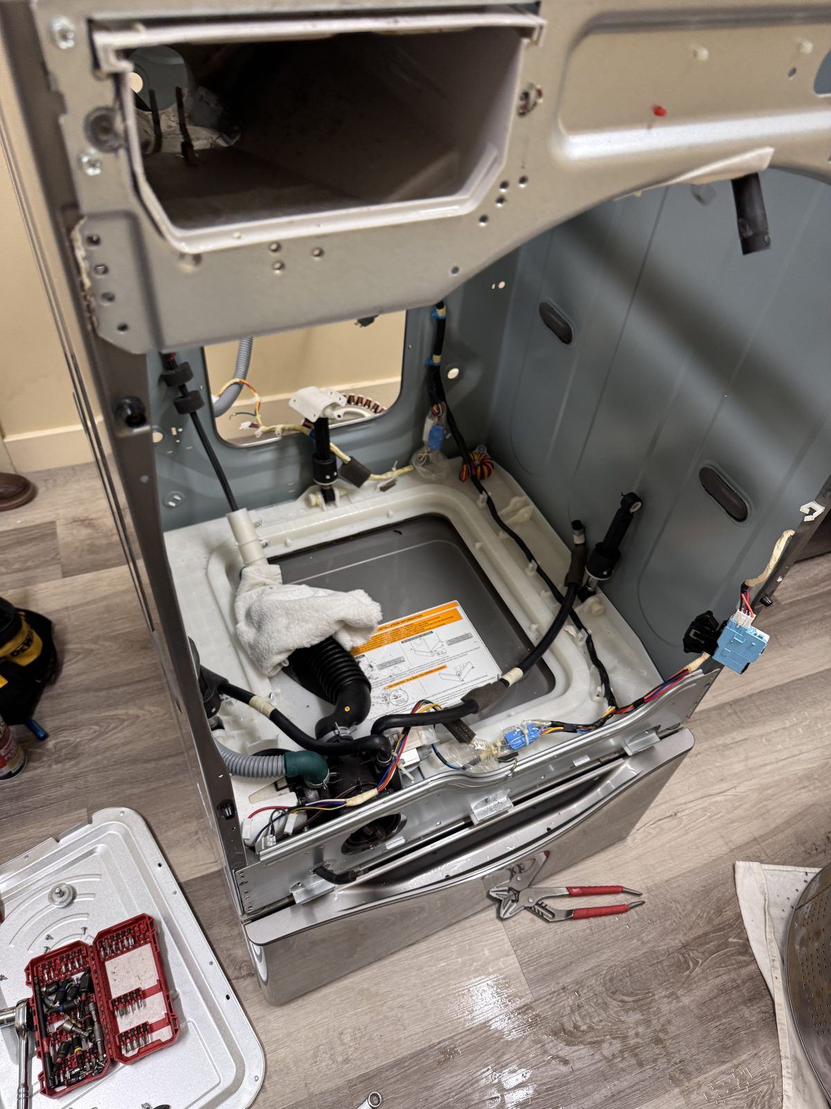 Full washing machine teardown on the repair bench in Mechanicsburg PA